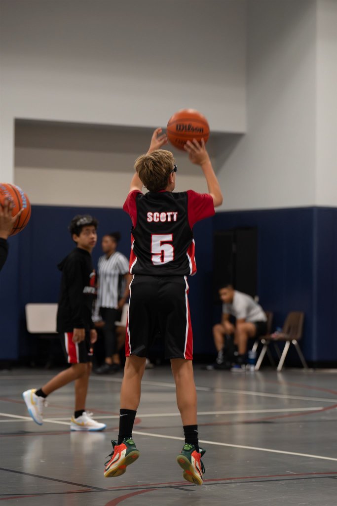 EXOS player rising into a jump shot