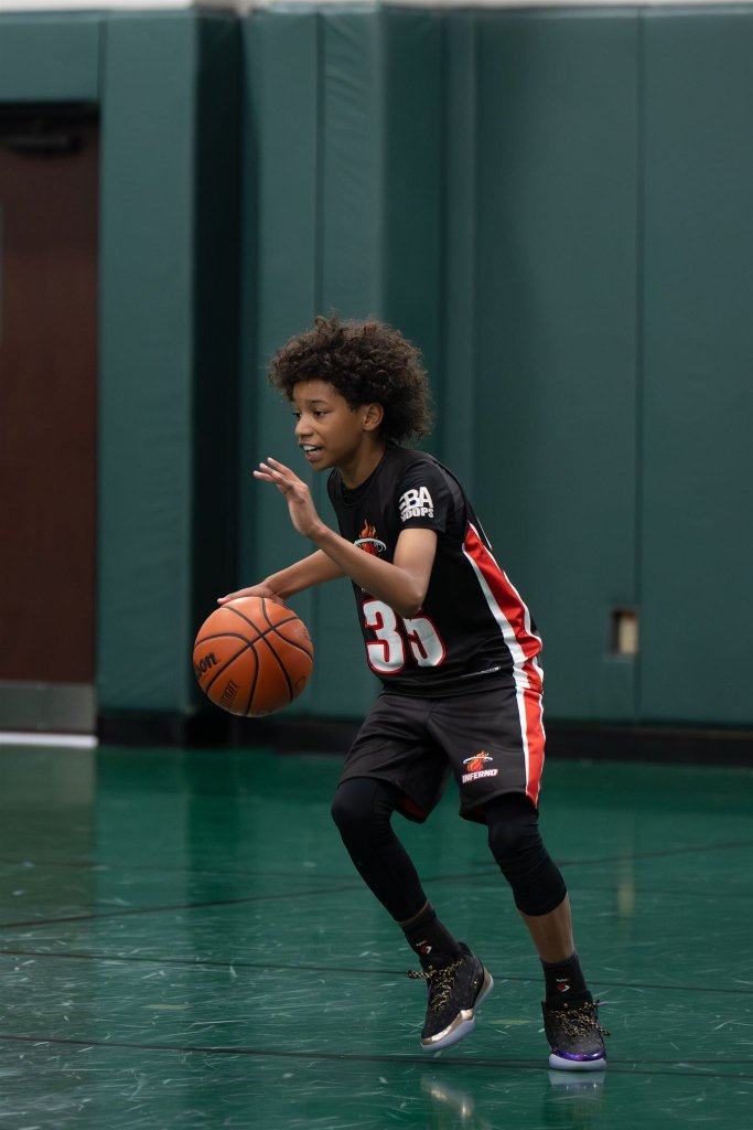 EXOS guard attacking off the dribble